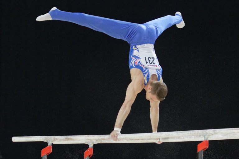 2015_European_Artistic_Gymnastics_Championships_-_Parallel_bars_-_Marius_Berbecar_04.jpg